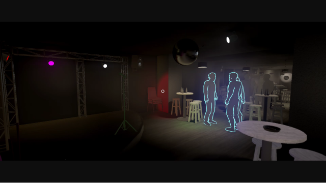 Students in a bar with a stage to the left of them.