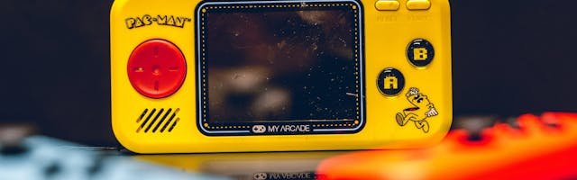 The Long Journey of Interactive Play: From Pac-Man to Online Games